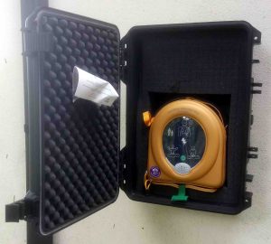 Defibrillator with case opened